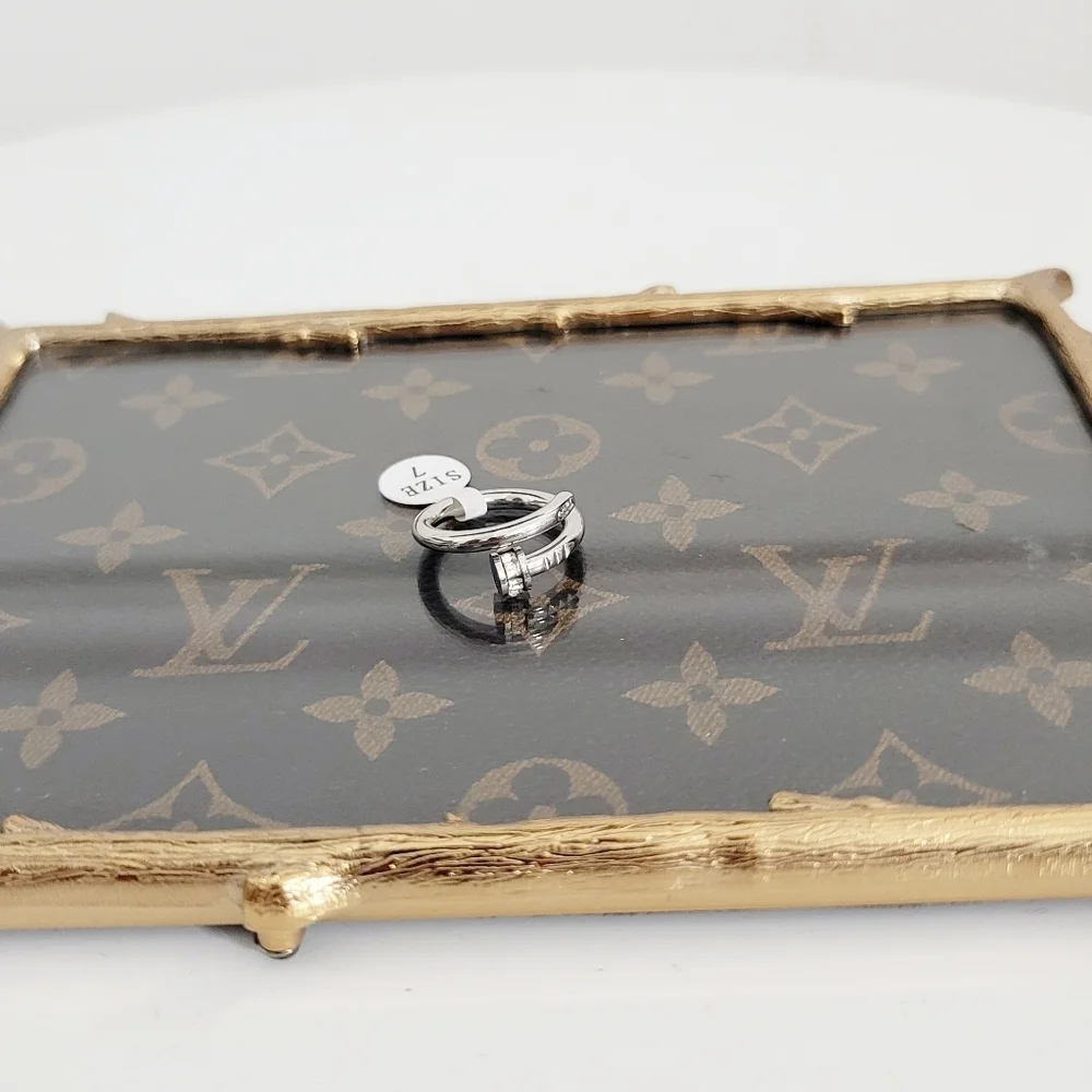Stainless steel silver tone nail ring nwt